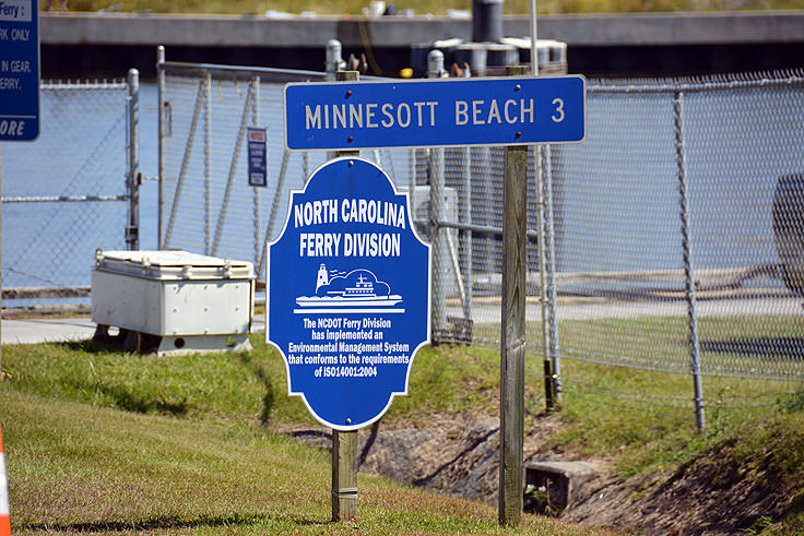 Cape Lookout Ferry Terminal signs. Minnesott Beach 3 miles.